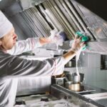 Sanitary day in the restaurant. Repeats wash your workplace. Cooks wash oven, stove and extractor in the Restaurant.